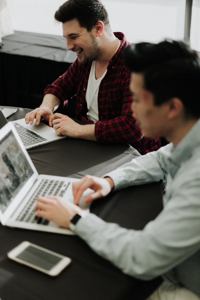 Business professionals reviewing documents during an audit
